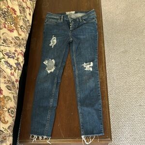 Distressed Blue Jeans
